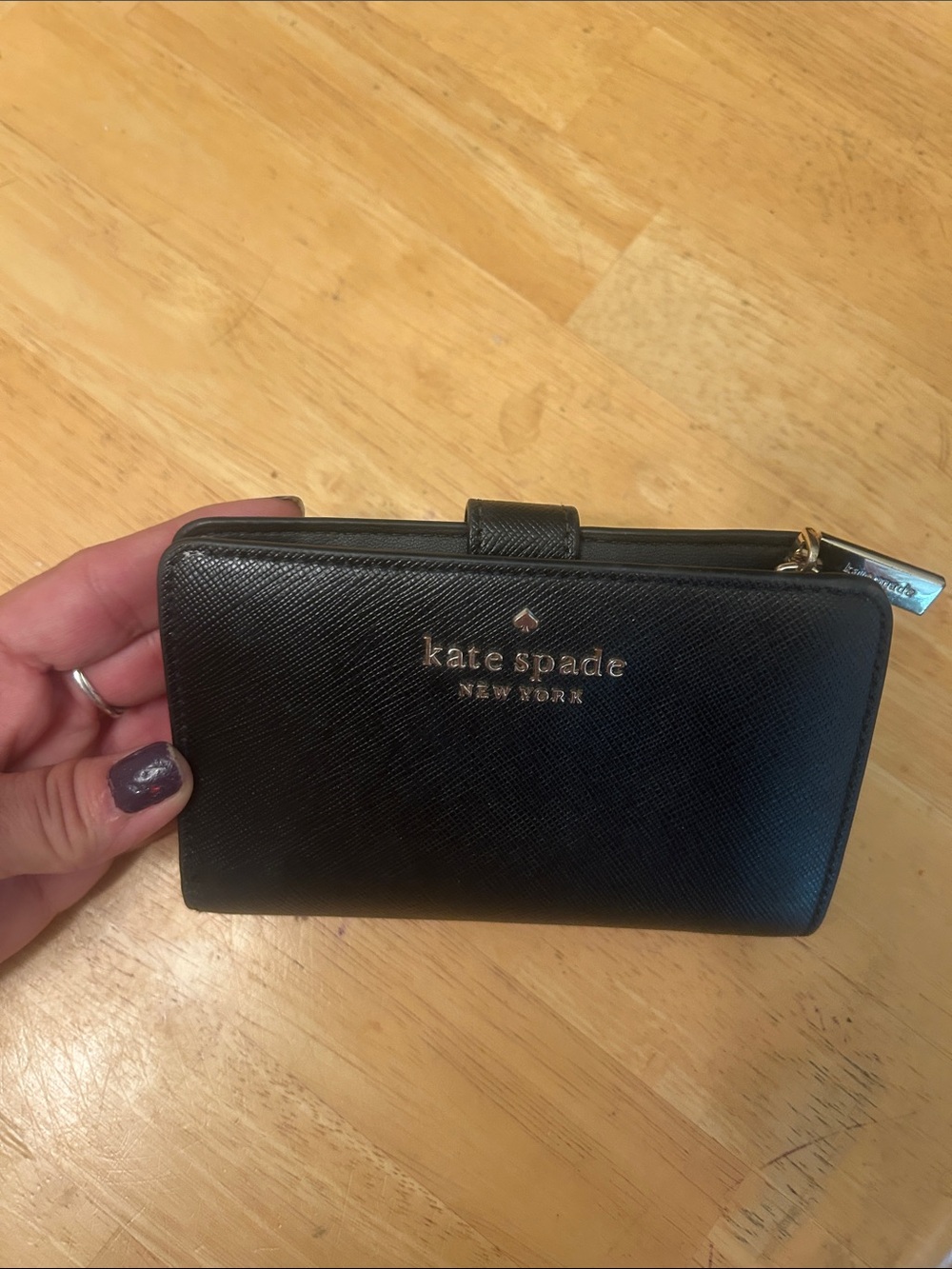 kate spade black saffiano zip & snap wallet with gold logo